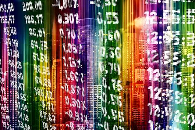 Stock Market representation of bright colored columns and dozens of decimals, numbers and percentages.